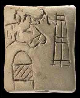 A clay tag from around 3200 B.C. has signs that scholars call proto-cuneiform. 