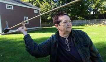 Ro Martinis of Ashland holds a prehistoric weapon called an atlatl, a prescurser to the bow and arrow. On Sunday Oct. 17 the Ashland Historical Society will present a program on Stone Age Hunters with artifcacts from Martinis' personal collection. 