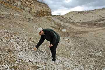 The author, Richard Stone, at the fossil site.