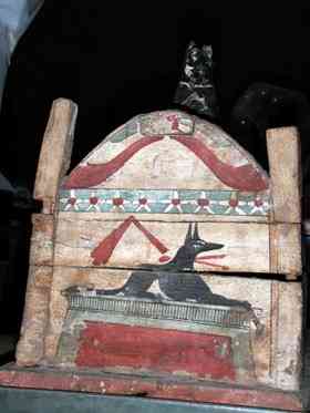 A dog's coffin. When dog owners died, their beloved pets were often constrained to join them in the afterlife -- by being either strangled or bludgeoned to death.