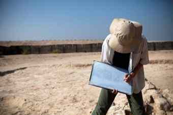 Sarah Bates records the patterns of rocks and other details at the site of the monastery.