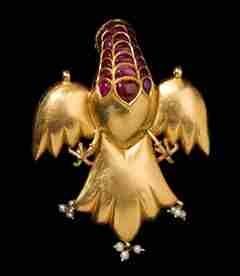 Pendant in the form of an eagle, Mughal India, 18th century. Gold, cast and chased, set with foiled diamonds, rubies, emeralds, and sapphires in gold kundan, JLY 2151