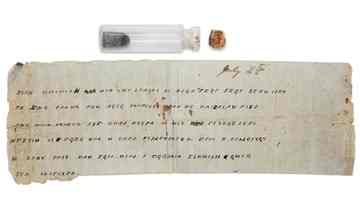 A Civil War bottle with a message that was tucked inside at the Museum of the Confederacy in Richmond, Va. The message to Lt. Gen. John C. Pemberton says reinforcements will not be arriving. The encrypted dispatch was dated July 4, 1863 _ the date of Pemberton's surrender to Union forces led by Ulysses S. Grant in what historians say was a turning point in the war. AP Photo/Museum of the Confederacy. 