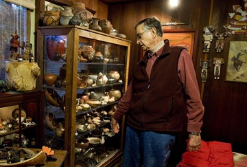Allan Hayes shows off his Southwestern Native American pottery collection at his home in Sausalito, Calif., Sunday, Dec. 5, 2010.
