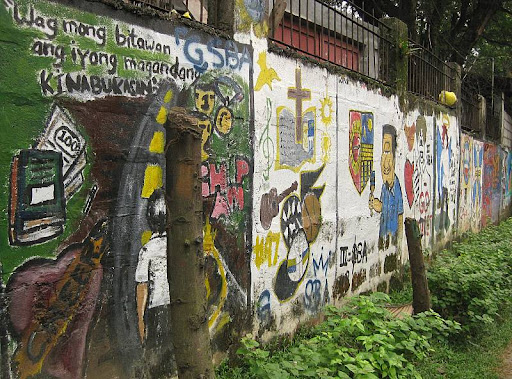 wall of Claret School of Quezon City painted by children with illustrations