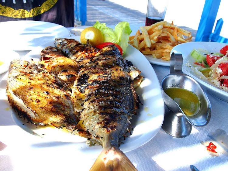 Lunch at To Psaraki restaurant by the Vlychada beach, Santorini.