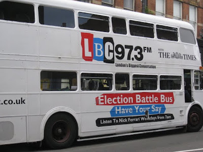 Bus in London painted with election slogans