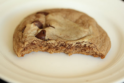close-up photo of a cookie with a bite taken out of it