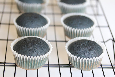 close-up photo of blueberry cupcakes on a baking rack