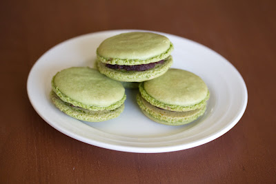 photo of three matcha macarons