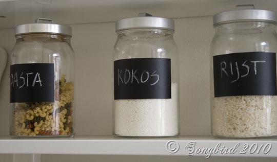 Three labeled glass jars