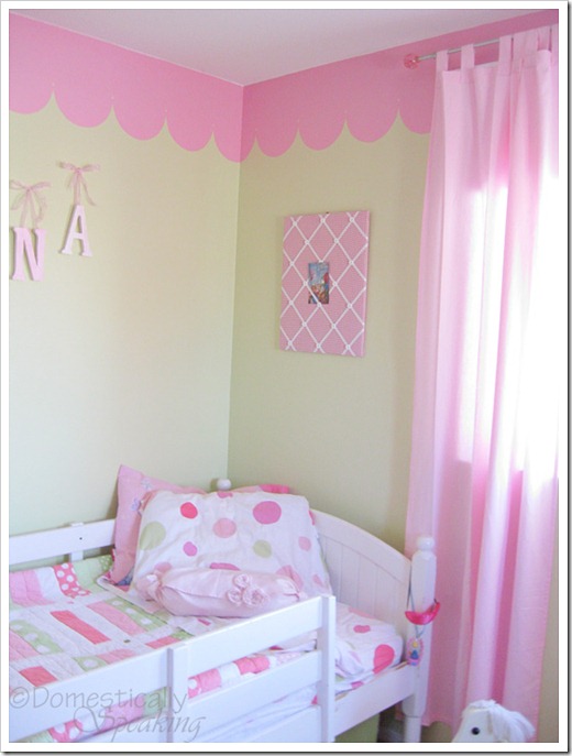 cute scallop board in a girl's bedroom