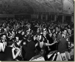 American bandleader and singer Cab Calloway leads an orchestra during a New Year's Ball at the Cotton Club in New York, 1937.