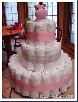 Diaper cake with ribbon affixed