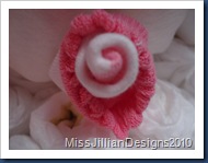 Pink & white baby sock rosette