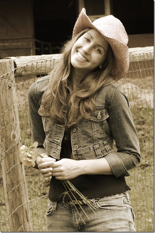 senior girl in cowboy hat - photo by Adrienne Zwart