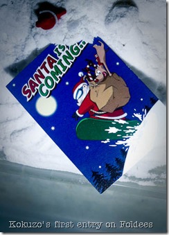 2008102323365400850284316046_Kokuzo - Snowboarding Santa (Cover)