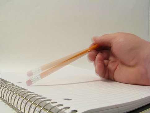 pencil tapping on-paper