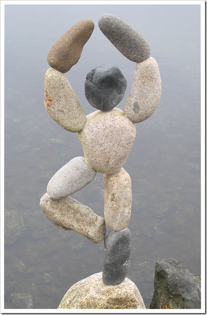 Rock person balancing