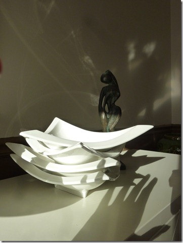 white dishes and tt sculpture