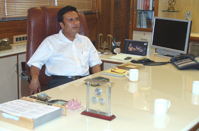 Mr. Siddharth Shah in his office