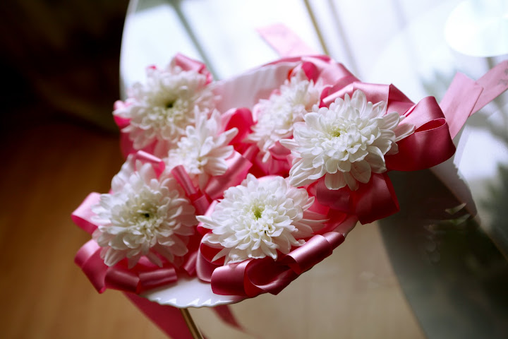 White chrysanthemum for wedding rings