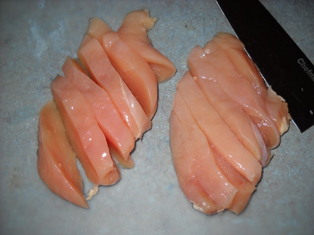 Chicken Strips sliced into thin slices with knife 