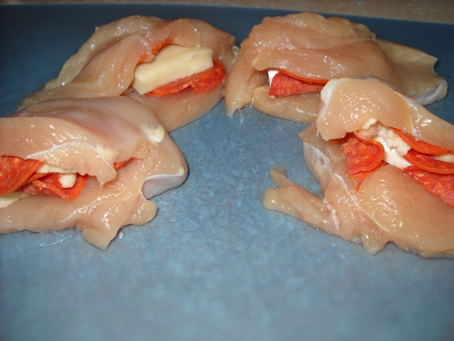 raw chicken stuffed with pepperoni and cheese 