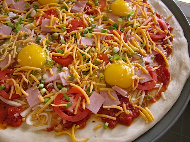 Close up of uncooked pizza 