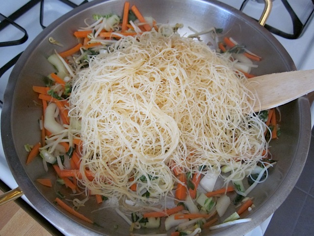 veggies with noodles in pan 
