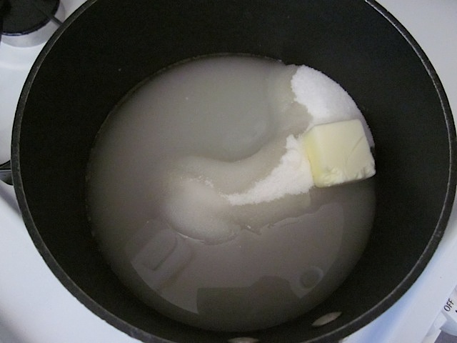 begin caramel sauce (sugar, water, butter and salt in a pot)