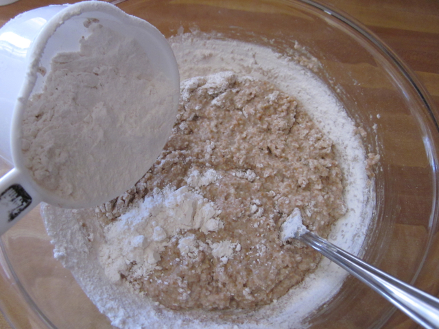 all purpose flour added to ingredients in mixing bowl 