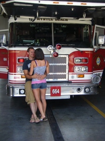 [Jenna and Jon David in front of Myrtle Beach Fire Truck where he proposed[2].jpg]