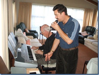 Another rare shot! Peter Littlejohn showing off his vocal skills as Peter Brophy played the Korg