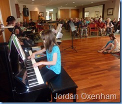 Jordan Oxenham, a student of Carole Littlejohn, played two pieces on the piano and then one piece on the Tyros keyboard accompanied by Carole Littlejohn on a Korg Pa1X keyboard.