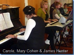 Carole Littlejohn accompanying her students, Mary Cohen on the Tyros 2 and James Hunter on the Korg Pa1X