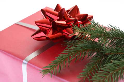 While red metallic wrapping paper looks festive, it\'s often not recyclable. Credit: Dreamstime