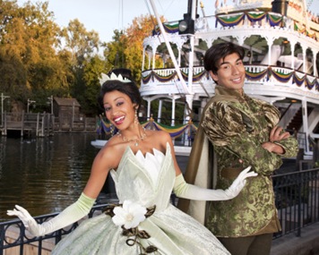 PRINCESS TIANA AND PRINCE NAVEEN -- Starting Friday, Nov. 6. Disneyland guests will be treated to appearances by Princess Tiana, star of the upcoming Walt Disney Pictures animated feature film “The Princess and the Frog.” Princess Tiana, Prince Naveen and other characters from the motion picture will star in “Tiana’s Showboat Jubilee!,” a rousing, colorful procession with a jazz-filled Mardi Gras theme.  The good times will roll as festively dressed, bead-tossing revelers lead Disneyland guests from New Orleans Square to the Mark Twain Riverboat dock. The party moves onboard as paddlewheels begin turning and the Mark Twain makes its way along the river to singing, dancing and all that jazz. (Paul Hiffmeyer/Disneyland)
