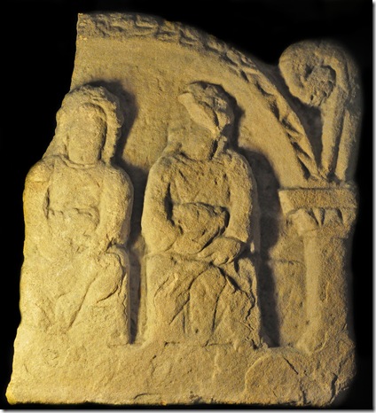 carving of seated mother goddesses holding baskets from the third century in britain