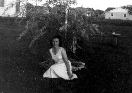 Mom by willow tree 1955