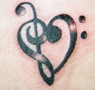 musical tattoo designs. Musical Note Tattoo Design.