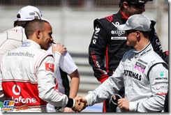 (L to R): Lewis Hamilton (GBR) McLaren with Michael Schumacher (GER) Mercedes GP.
Formula One World Championship, Rd 1, Bahrain Grand Prix, Race Day, Bahrain International Circuit, Sakhir, Bahrain, Sunday 14 March 2010.
