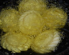 Add to oil and remove from flame