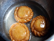 Dip in sugar syrup
