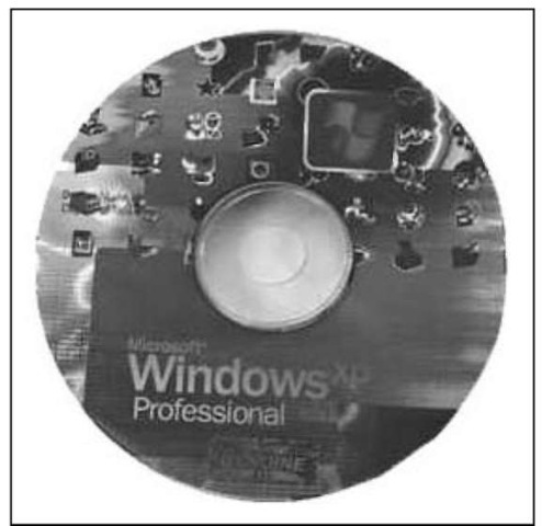  A Windows XP CD-t a hologrammal ellátott oldalon jelölheti meg.