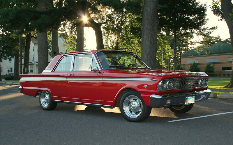  2-door sedan glory with 72000 original miles, a Rangoon red paint-job, and a matching red interior.