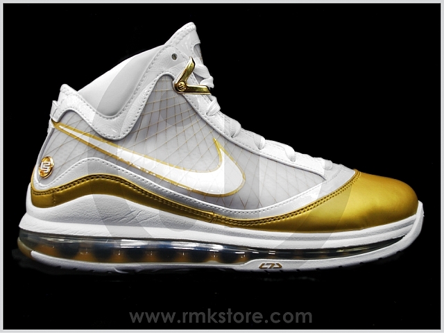lebron james gold and white shoes