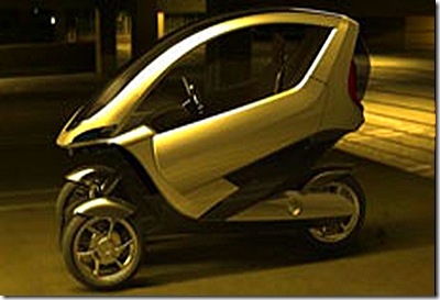 ttwone02_m,auto elettrica,scooter elettrico,scooter per città,scooter ibrido,propulsione elettrica,scooter coperto elettrico,energie alternative,scooter da città,tre ruote scooter,auto tre ruote,auto a tre ruote,tre ruote per la città,basta auto,città senza auto
