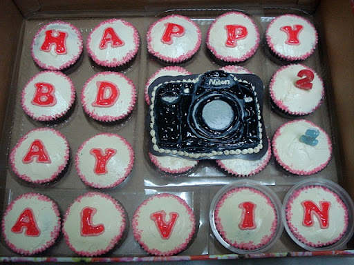Cupcakes with alphabet and Camera picture