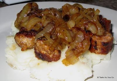 Pan-Fried Chorizo with Caramelized Onions over Mashed Potatoes | Taste As You Go